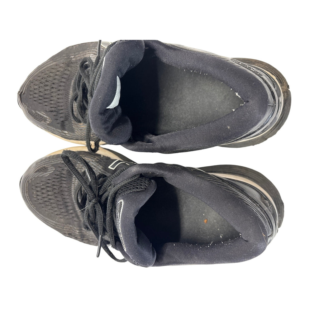 ASICS GEL-Nimbus 21 men’s running shoes in black with white and gray accents.